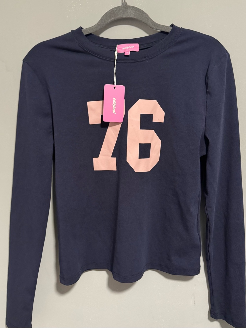 NWT- Edikted- Women’s “76” Stretch Cotton Graphic Long Sleeve Tee. Size XL